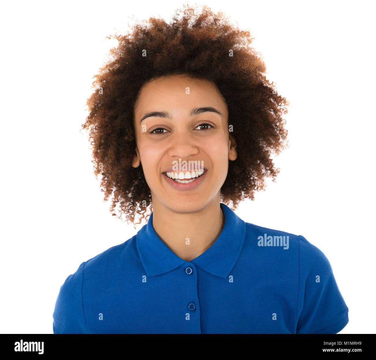 Smiling Young Female Janitor Standing In Front Of White Background
