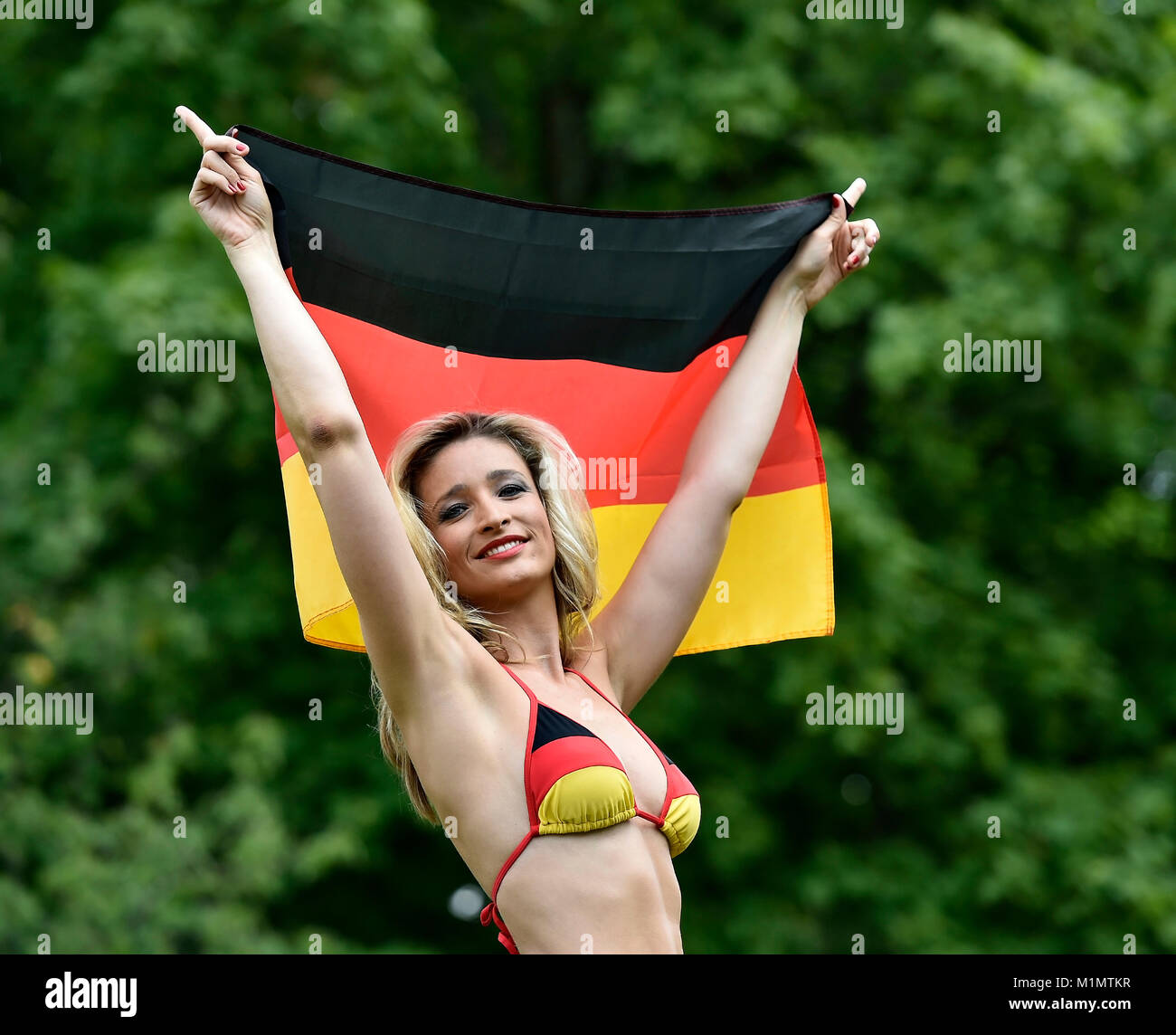 WM-girl, female fan of the national team, bikini in national colors, German national flag, the national flag, flag, Banner, cheers, Cheers, WM-Girl, w Stock Photo