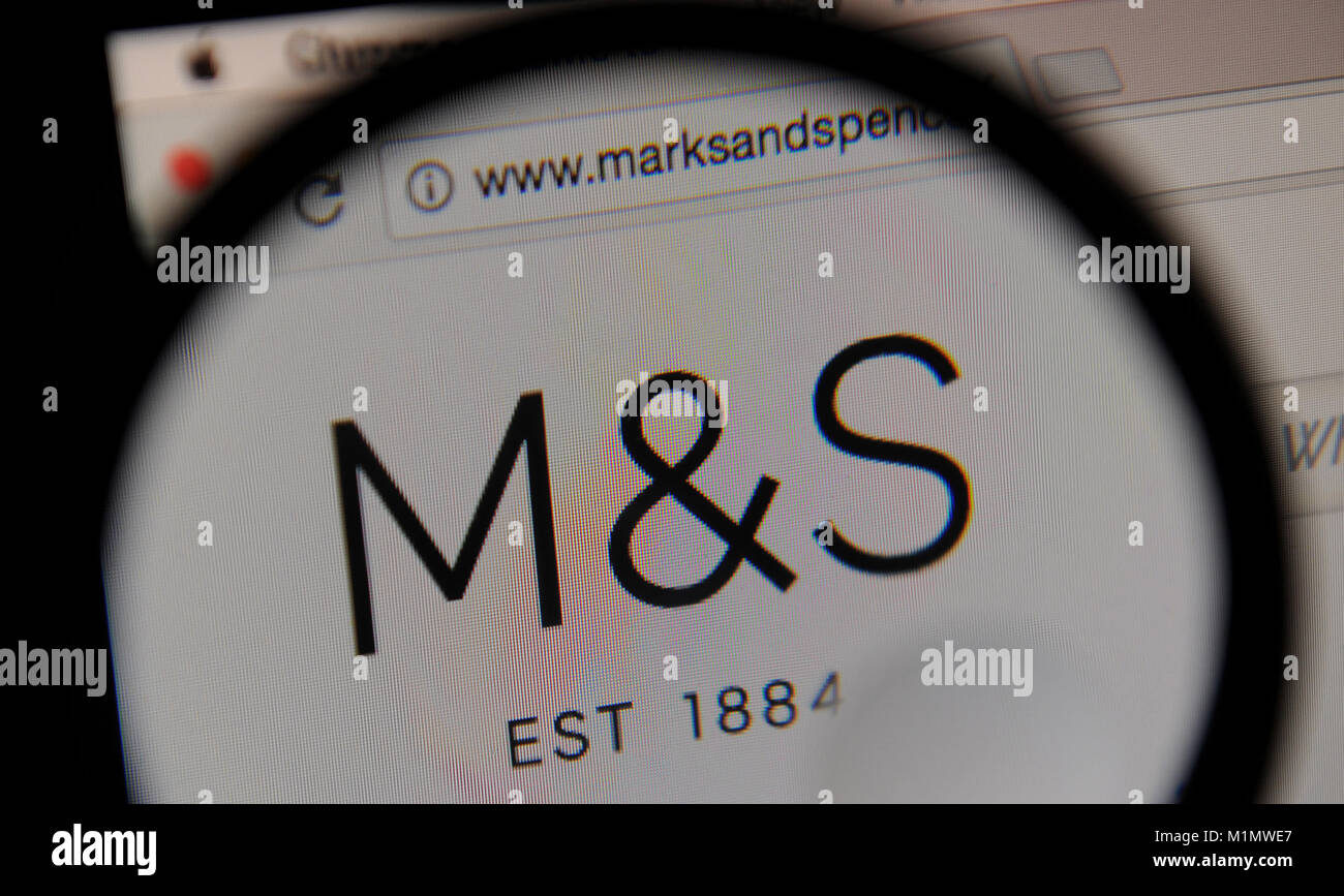 The Marks and Spencer website seen through a magnifying glass Stock