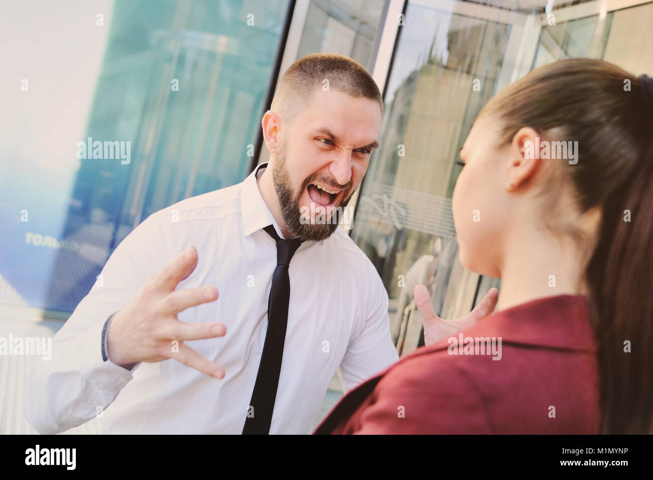 boss screams and scolds his employees Stock Photo