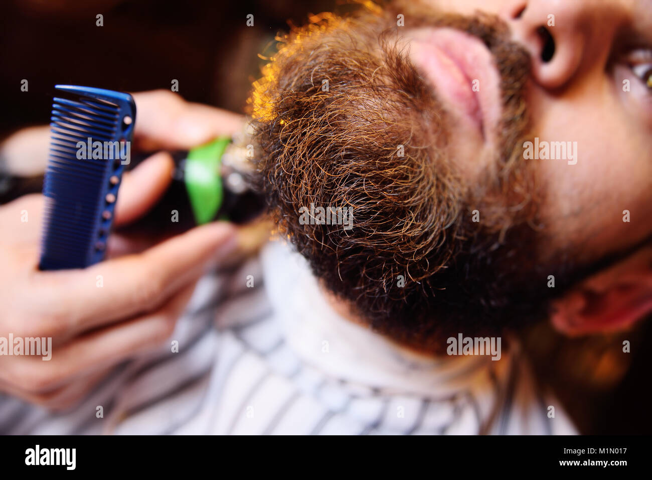 Shaving your beard in Stock Photo Alamy
