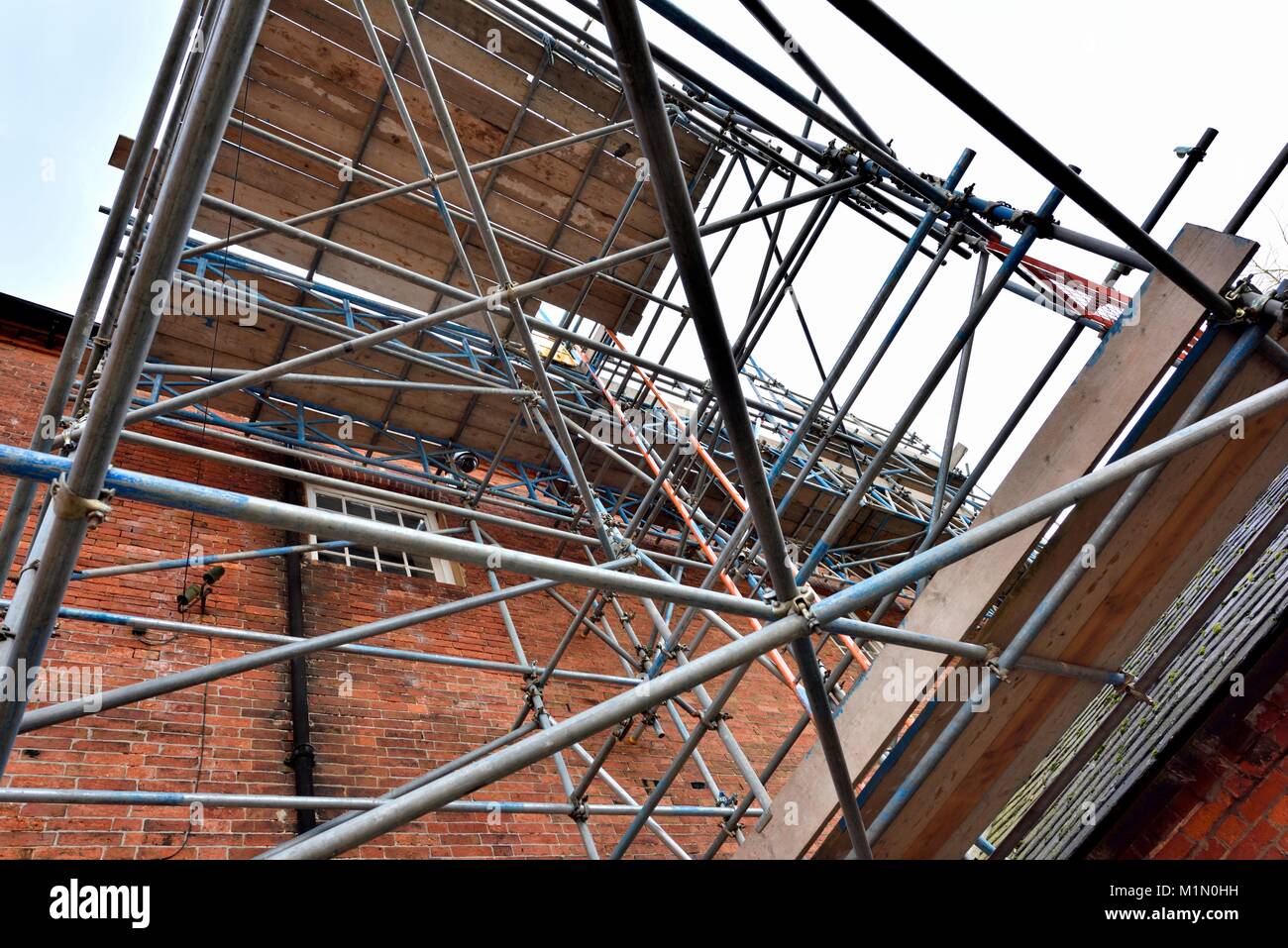 Scaffolding being used to renovate an old building Stock Photo