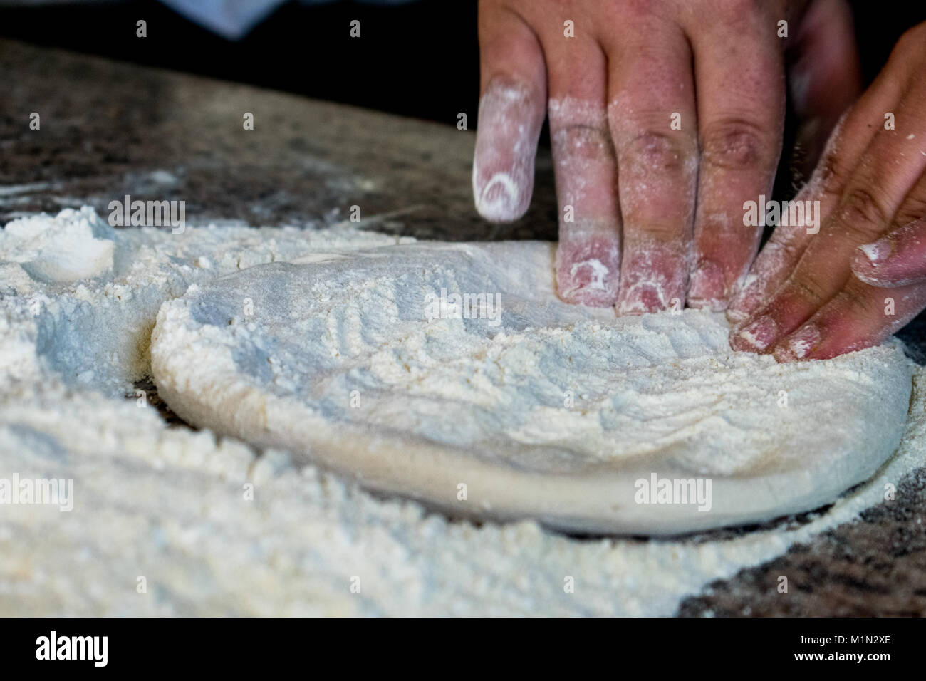 Pizza dough kneading Stock Photo Alamy
