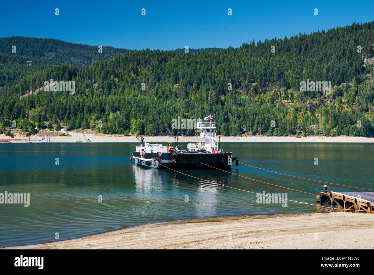Needles cable ferry crossing Lower Arrow Lake to Needles, Monashee Mountains in distance, West