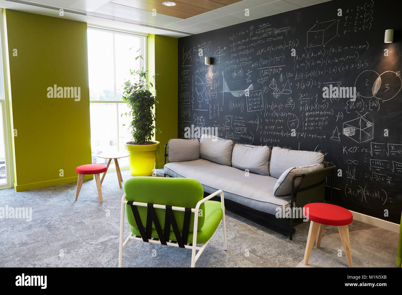 Casual meeting lounge area in an empty business premises Stock Photo