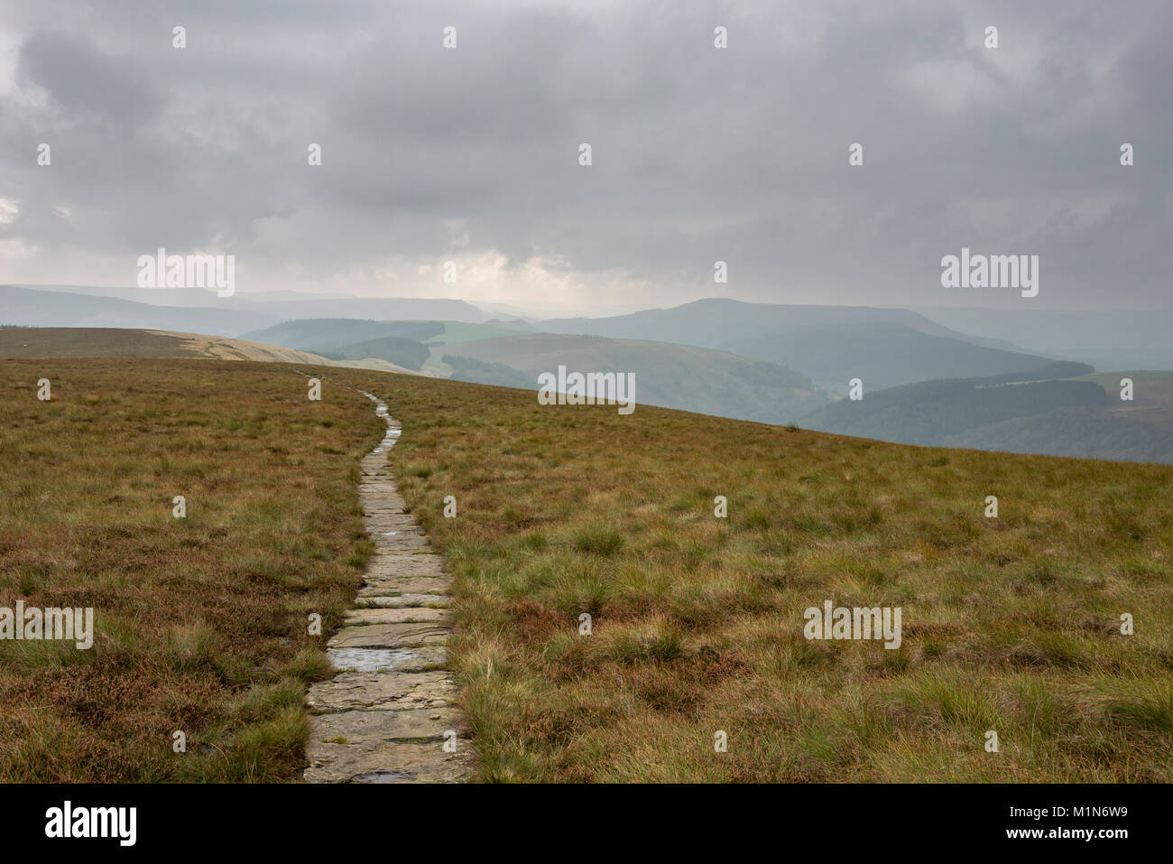 Paved path on the hills above Snake Pass in the Peak District, Derbyshire, England. Stock Photo