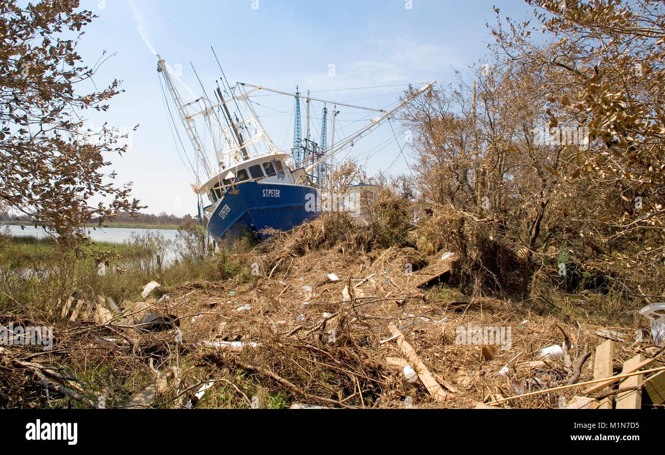 The shrimp trawler, St. Peter, washed up on the beach above the mean high tide mark by the storm surge at Bayou La Batre, Alabama after hurricane Katr Stock Photo