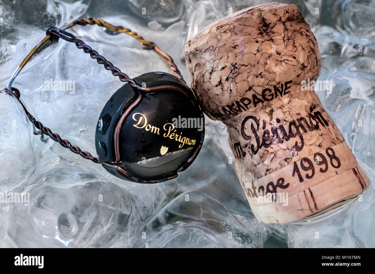Dom Perignon vintage 1998 champagne cork and wire retaining cap in ice bucket chiller cooler Stock Photo