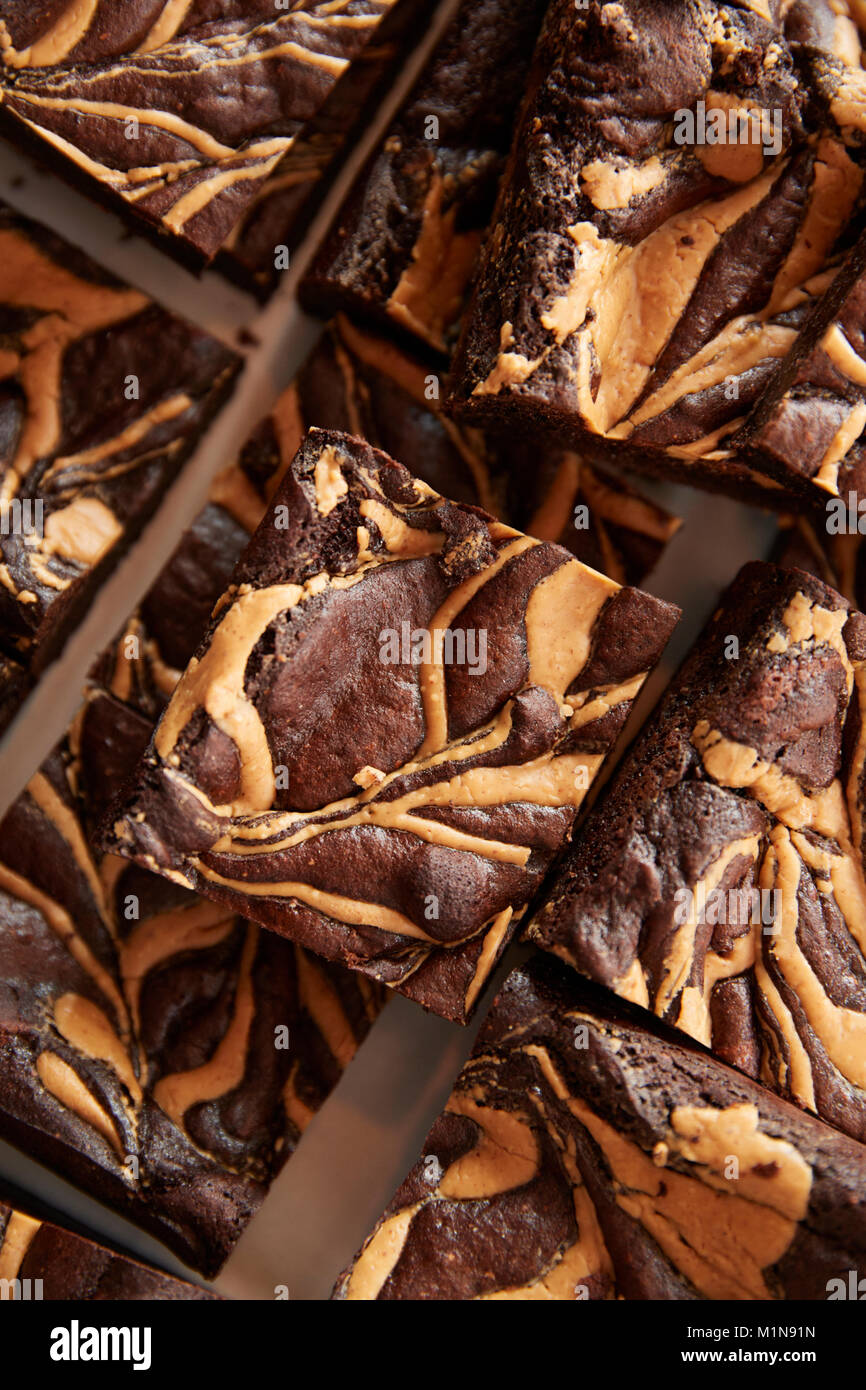 Display Of Freshly Baked Peanut Brownies In Coffee Shop Stock Photo