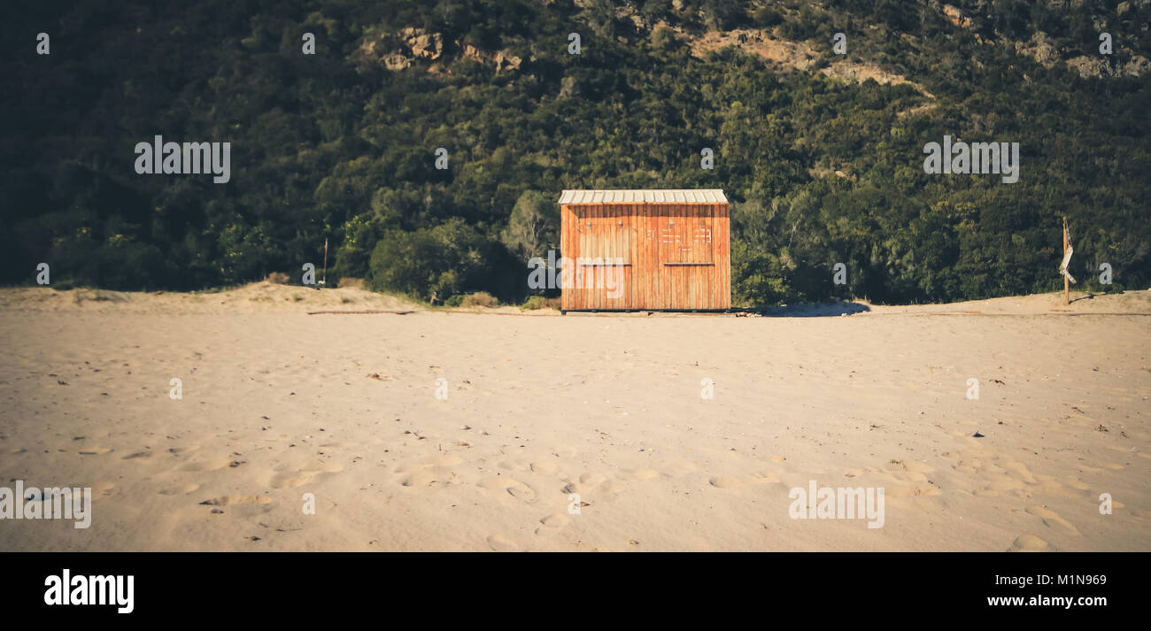 wood-beach-hut-with-vegetation-in-background-stock-photo-alamy