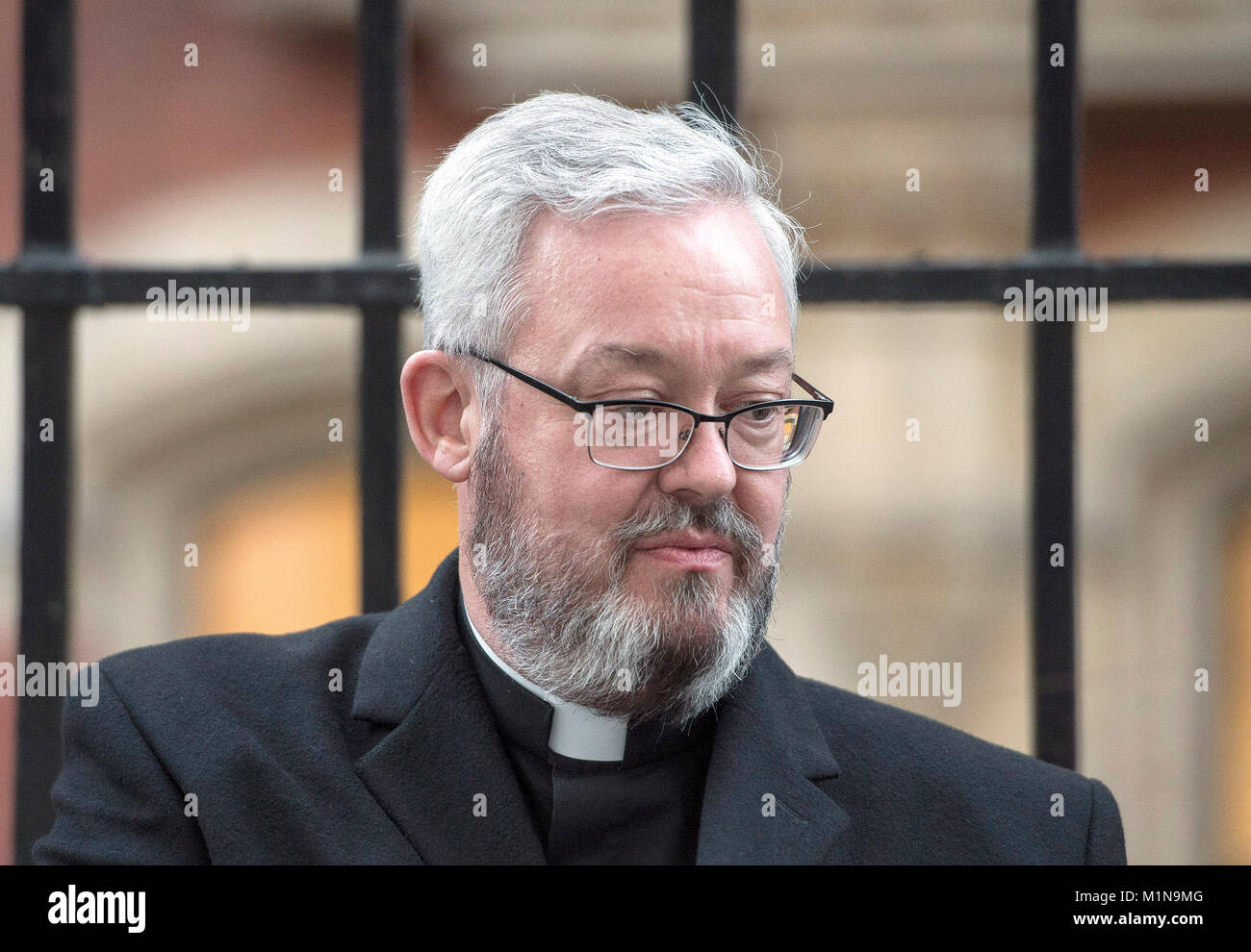 Canon Jeremy Pemberton at the Royal Courts of Justice in London, as the gay priest who was prevented from working as a hospital chaplain after marrying his partner, has urged senior judges to find that he has suffered discrimination. Stock Photo