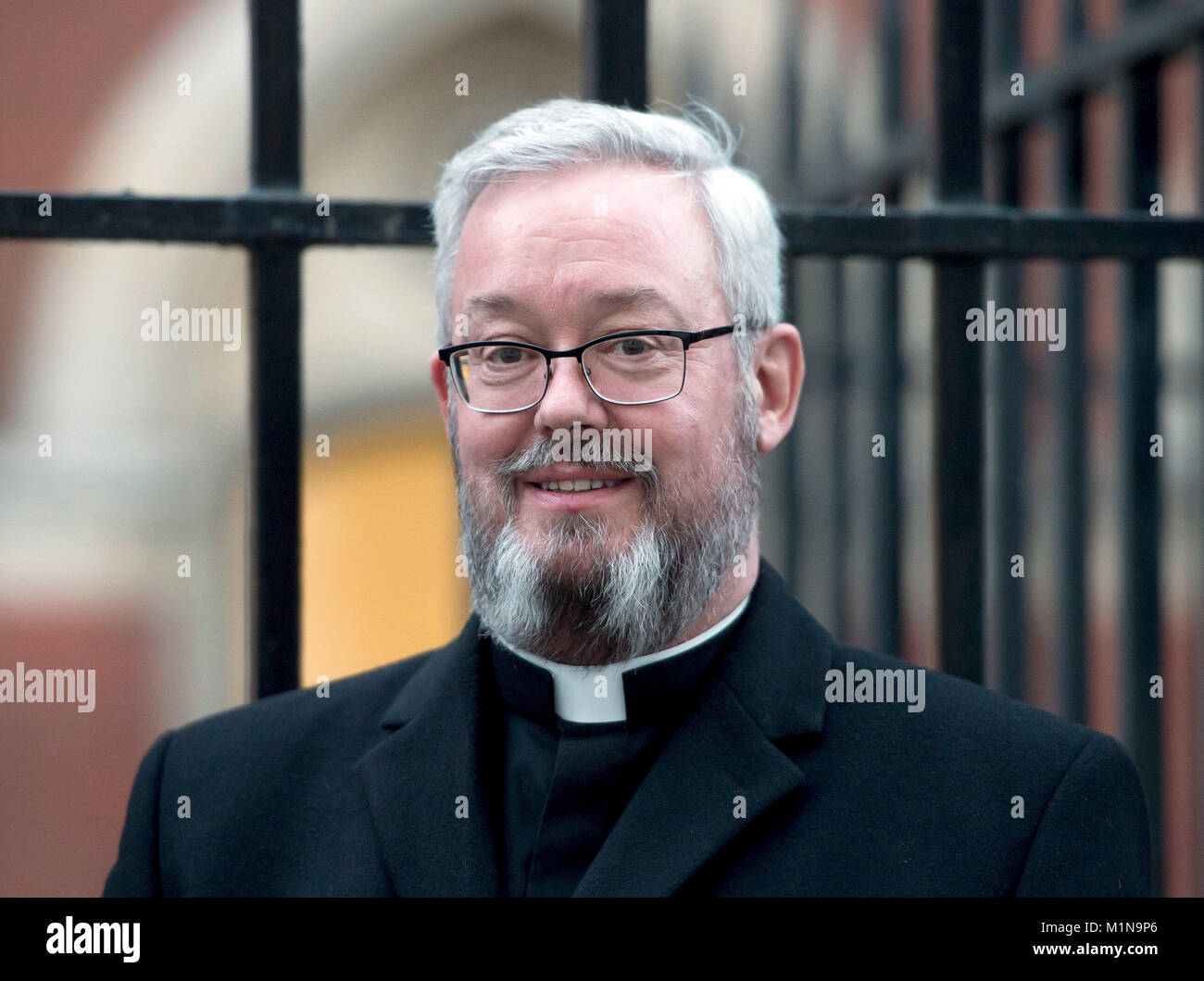 Canon Jeremy Pemberton at the Royal Courts of Justice in London, as the gay priest who was prevented from working as a hospital chaplain after marrying his partner, has urged senior judges to find that he has suffered discrimination. Stock Photo