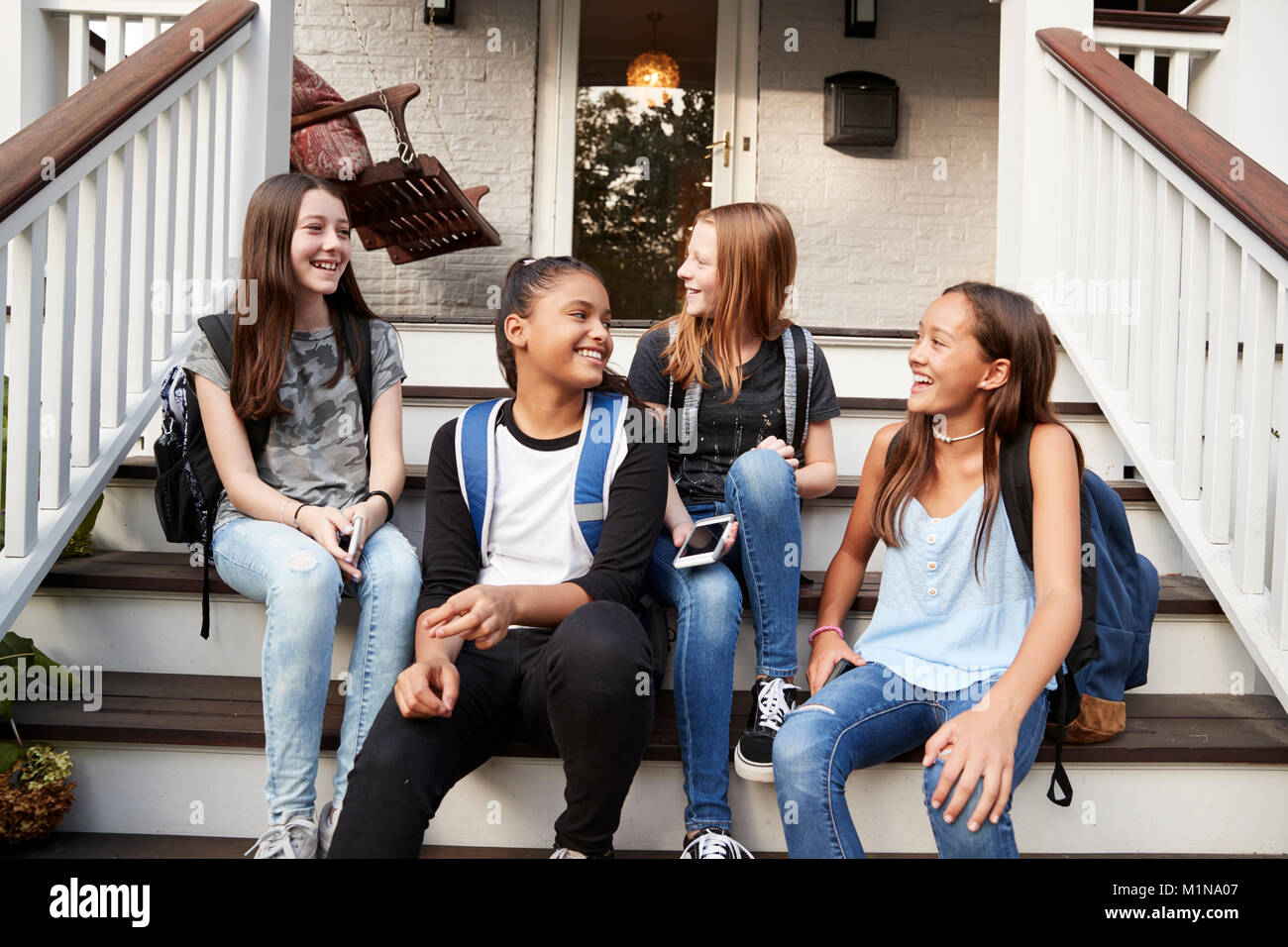 Laughing school girls hi-res stock photography and images - Alamy