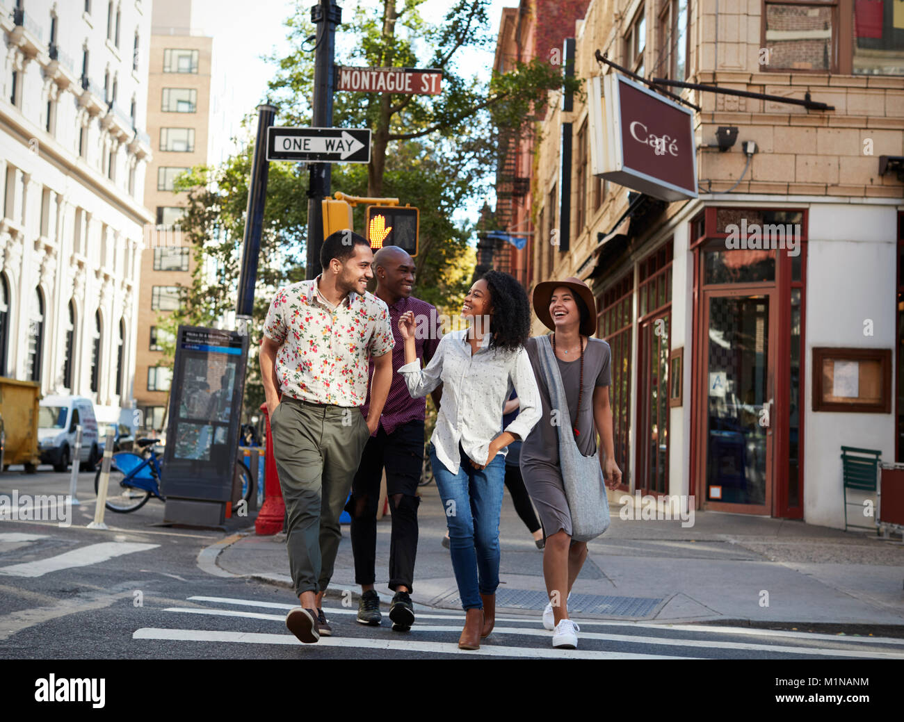 Group Of Friends Crossing Urban Street In New York City Stock Photo Alamy