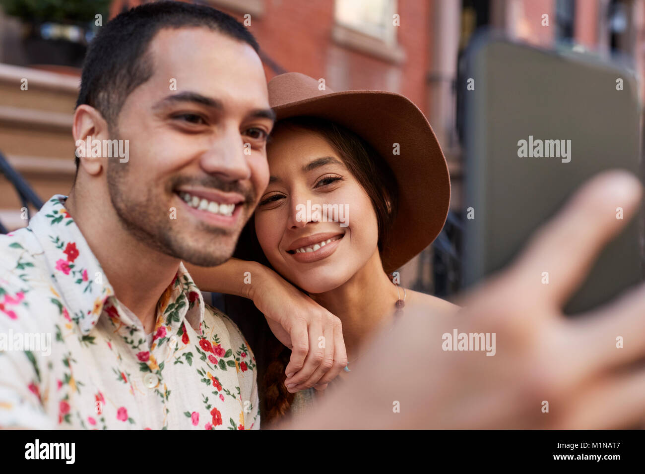 Couple Posing For Selfie On Street In New York City Stock Photo