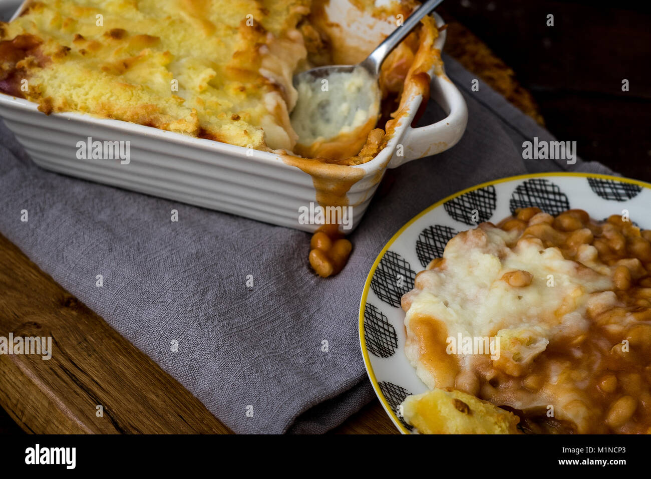 My idea of comfort food is this cheese and baked bean pie Stock Photo