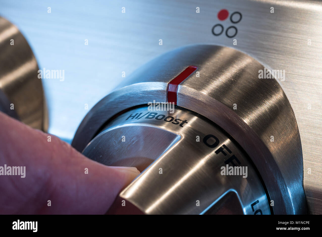 Stainless steel control knob on cooker Stock Photo Alamy