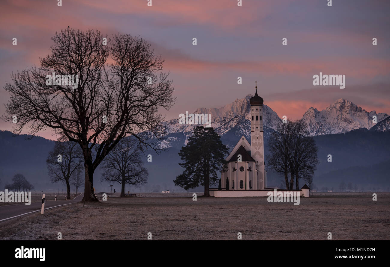 Beautiful bavarian sunrise at St. Coloman church, Germany Stock Photo ...