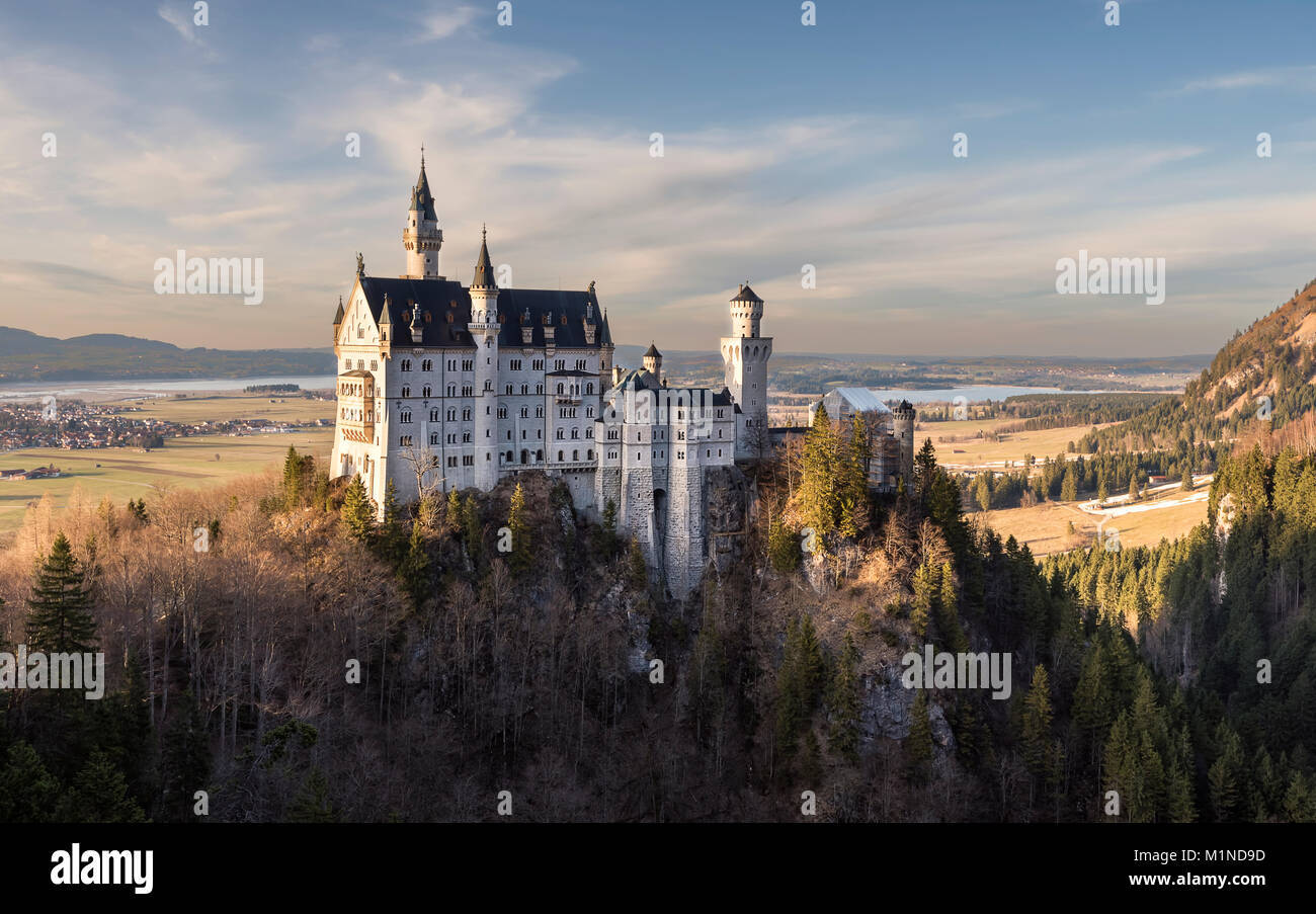 Neuschwanstein Castle is a 19th-century Romanesque Revival palace on a rugged hill above the village of Hohenschwangau  in southwest Bavaria Stock Photo