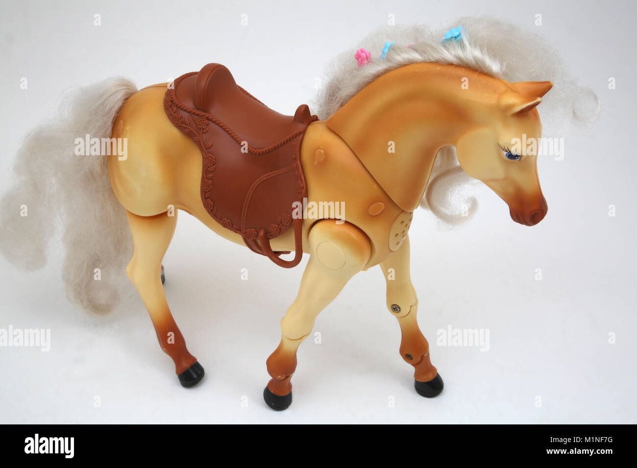 toy horse that walks and neighs
