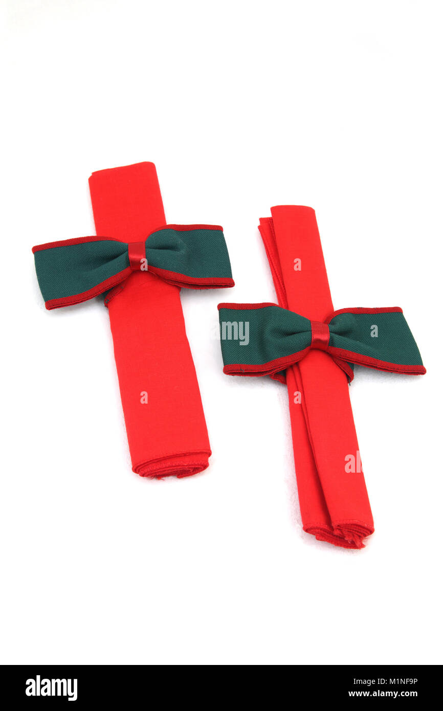 Red Serviettes Tied Up In A Green Bow Stock Photo