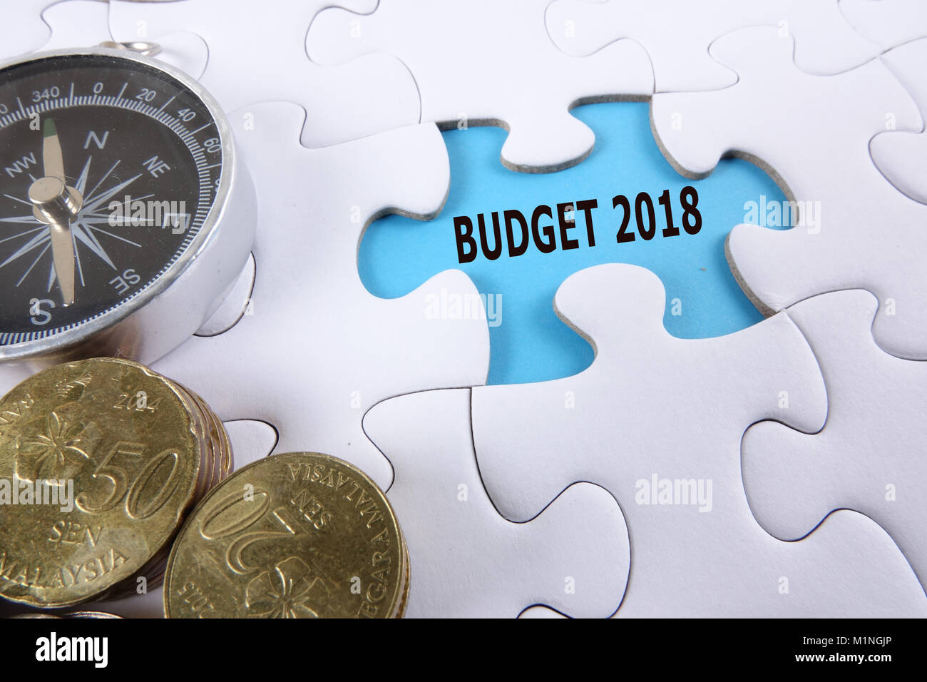 Economy puzzle words on jigsaw hi res stock photography and images