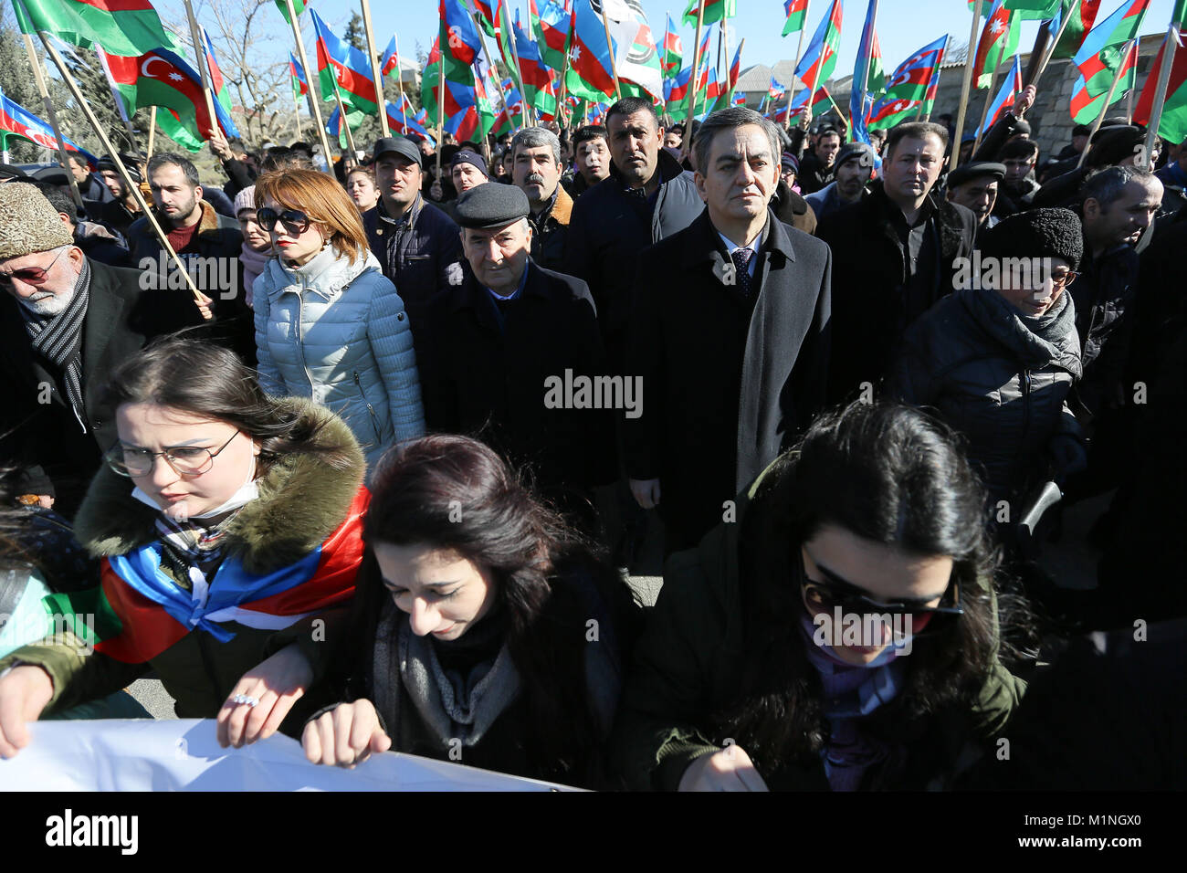 Azerbaijan. 31st Jan, 2018. Opposition parties and Azerbaijan flags during the 134th birth anniversary of Mammad Amin Rasulzade in Baku's village in Novkhani. Today is the 134th birth anniversary of Mammad Amin Rasulzade, one of the founding political leaders of Azerbaijan Democratic Republic. Credit: Aziz Karimov/Pacific Press/Alamy Live News Stock Photo