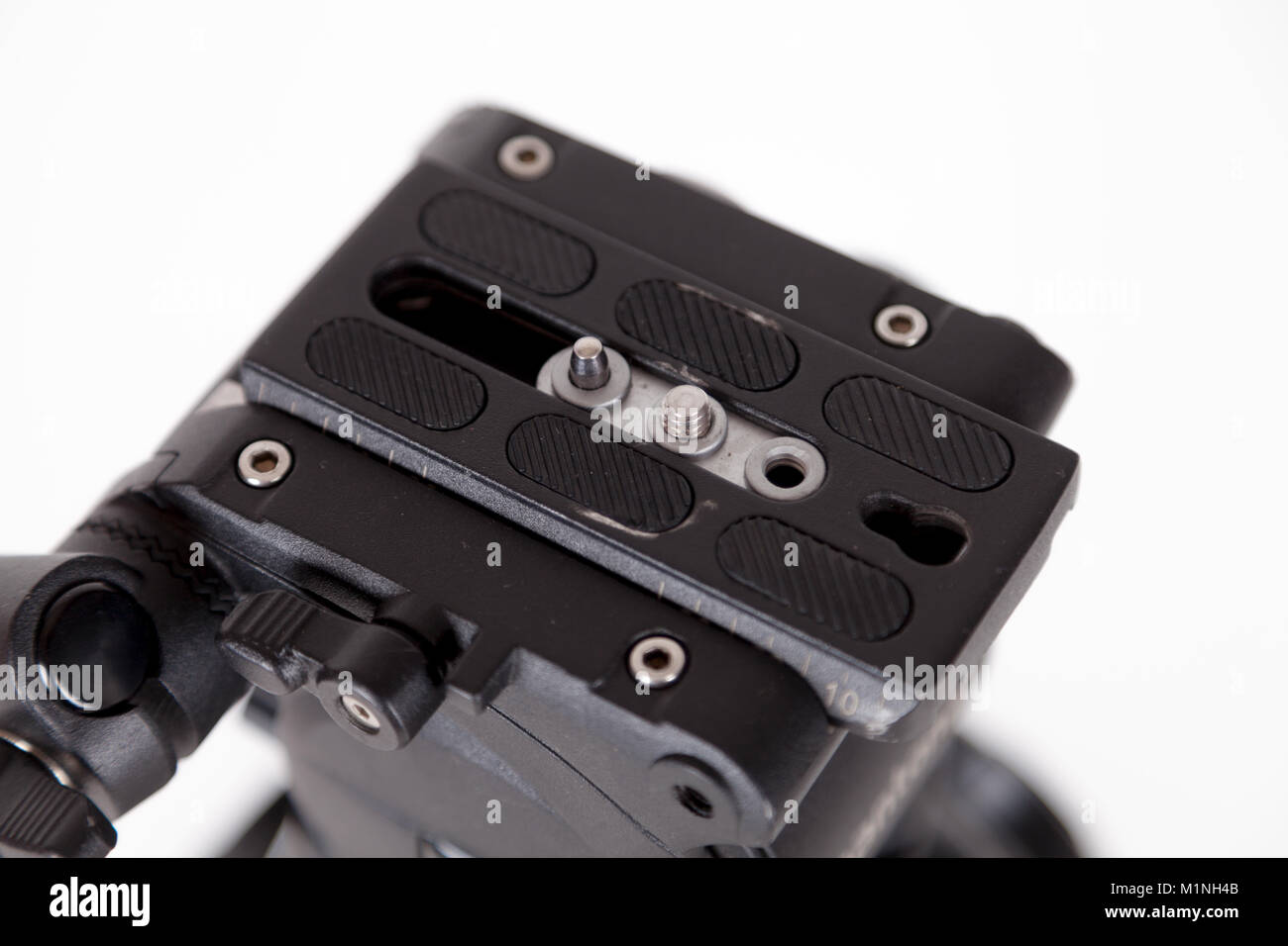 black camera tripod on white background Stock Photo - Alamy