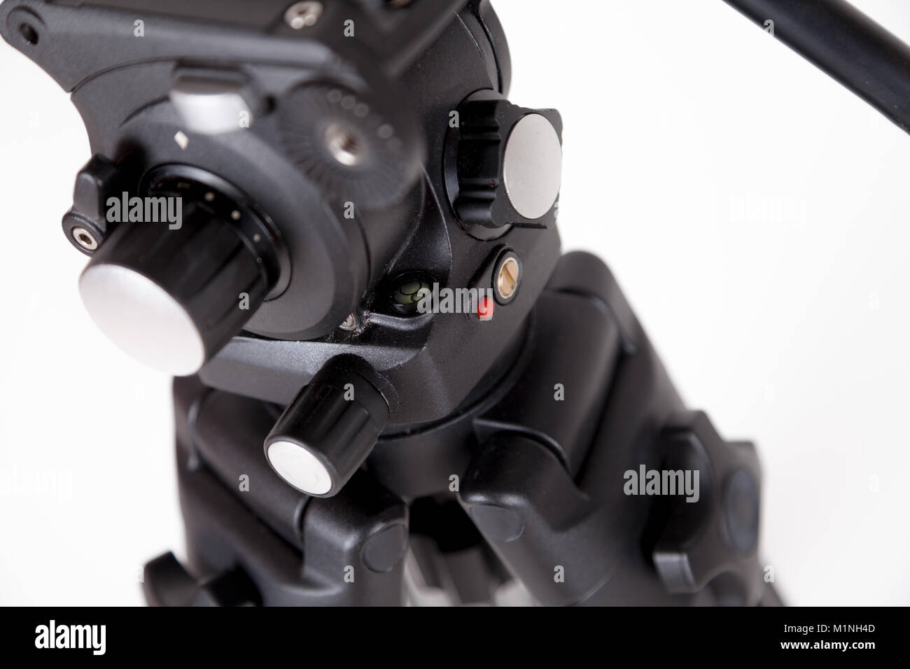 black camera tripod on white background Stock Photo - Alamy