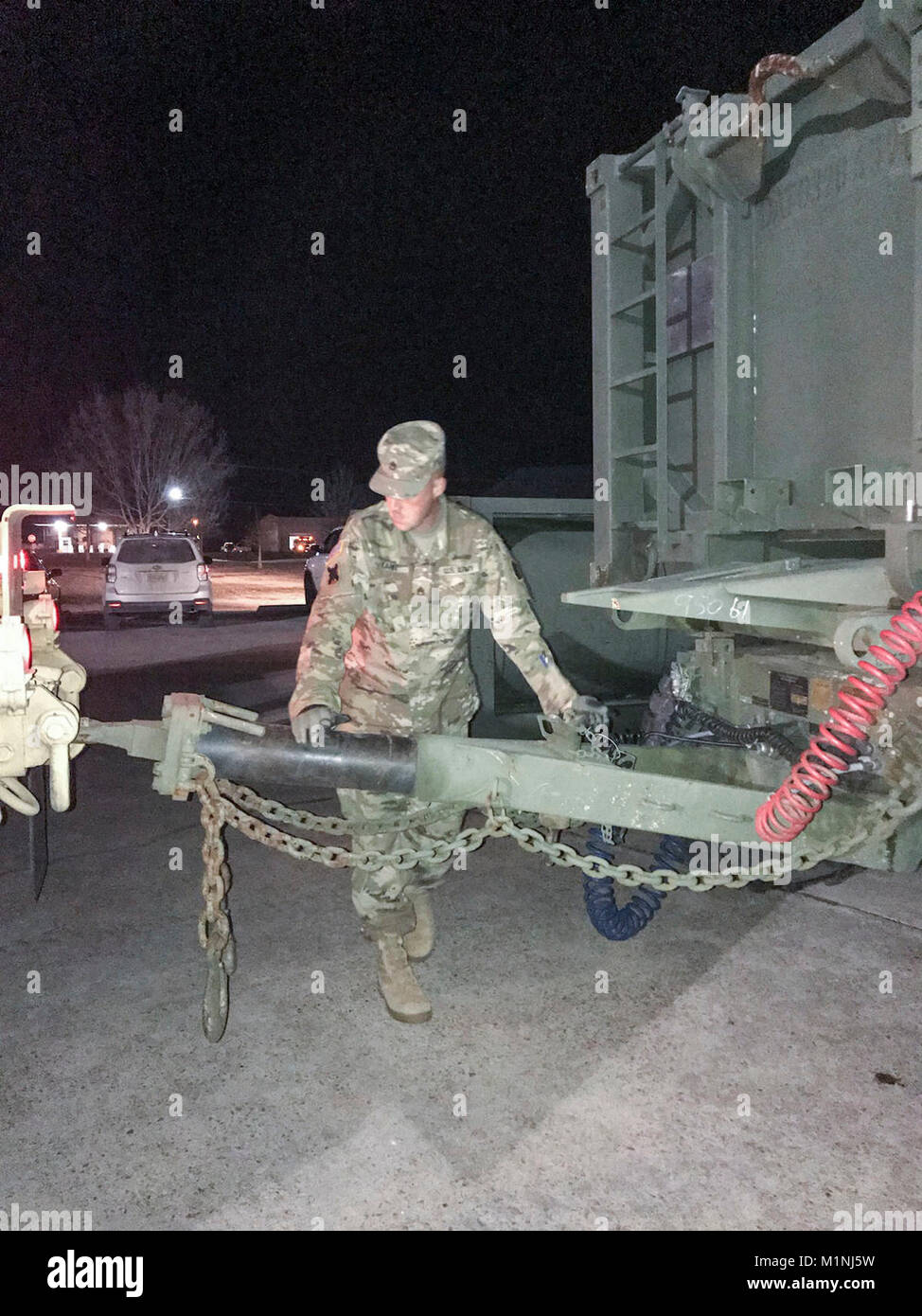 Louisiana National Guard Staff Sgt. Casey Zahn, a supply sergeant with A Company, 199th Brigade Support Battalion, 256th Infantry Brigade Combat Team, stages water trailers at the Olive Branch Senior Care Center in Tallulah, Louisiana, Jan. 24, 2018. The care center’s water supply was impacted by the freezing temperatures last week which caused a critical system malfunction at the local water plant. ( Stock Photo