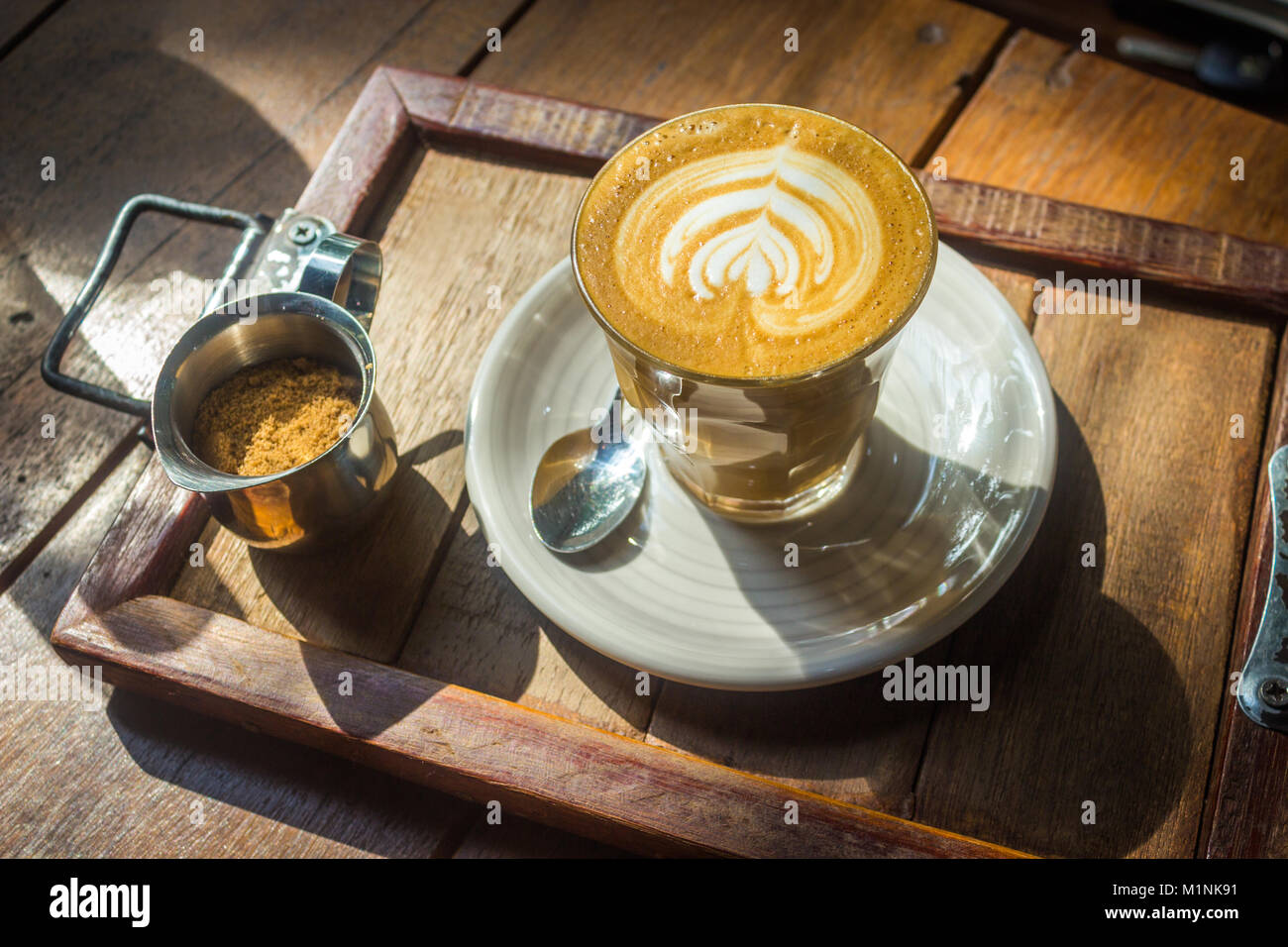 coffee cup with morning sunlight on wood table background Stock Photo ...