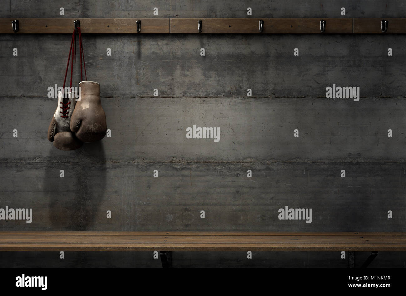 Spotlit old vintage boxing gloves hanging on a hanger above an empty wooden bench in a locker change room - 3D render Stock Photo