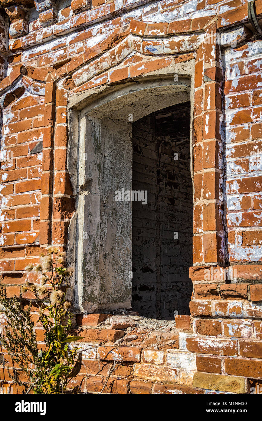 Window hole of the old destroyed building of red brick Stock Photo Alamy