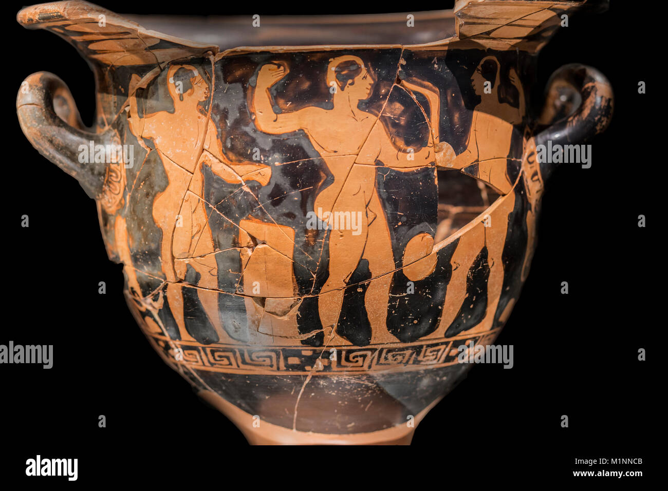 Jaen, Spain - December 29th, 2017: Ancient greek krater found at Piquia Burial Chamber. Sportsmen with Strigil. Iberian Museum of Jaén Stock Photo