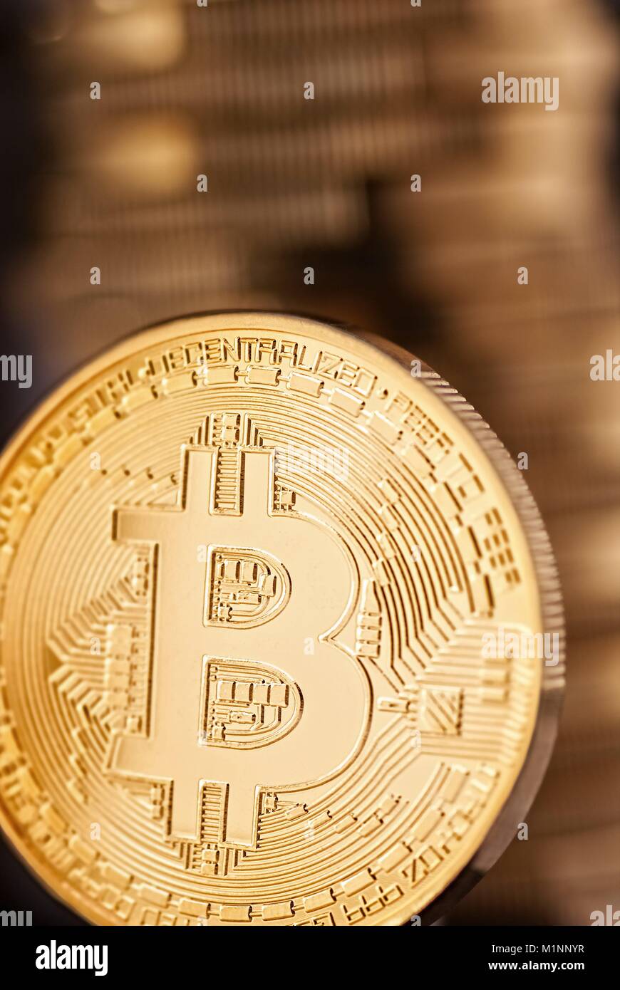 Bitcoin with coins stack in the background | usage worldwide Stock Photo