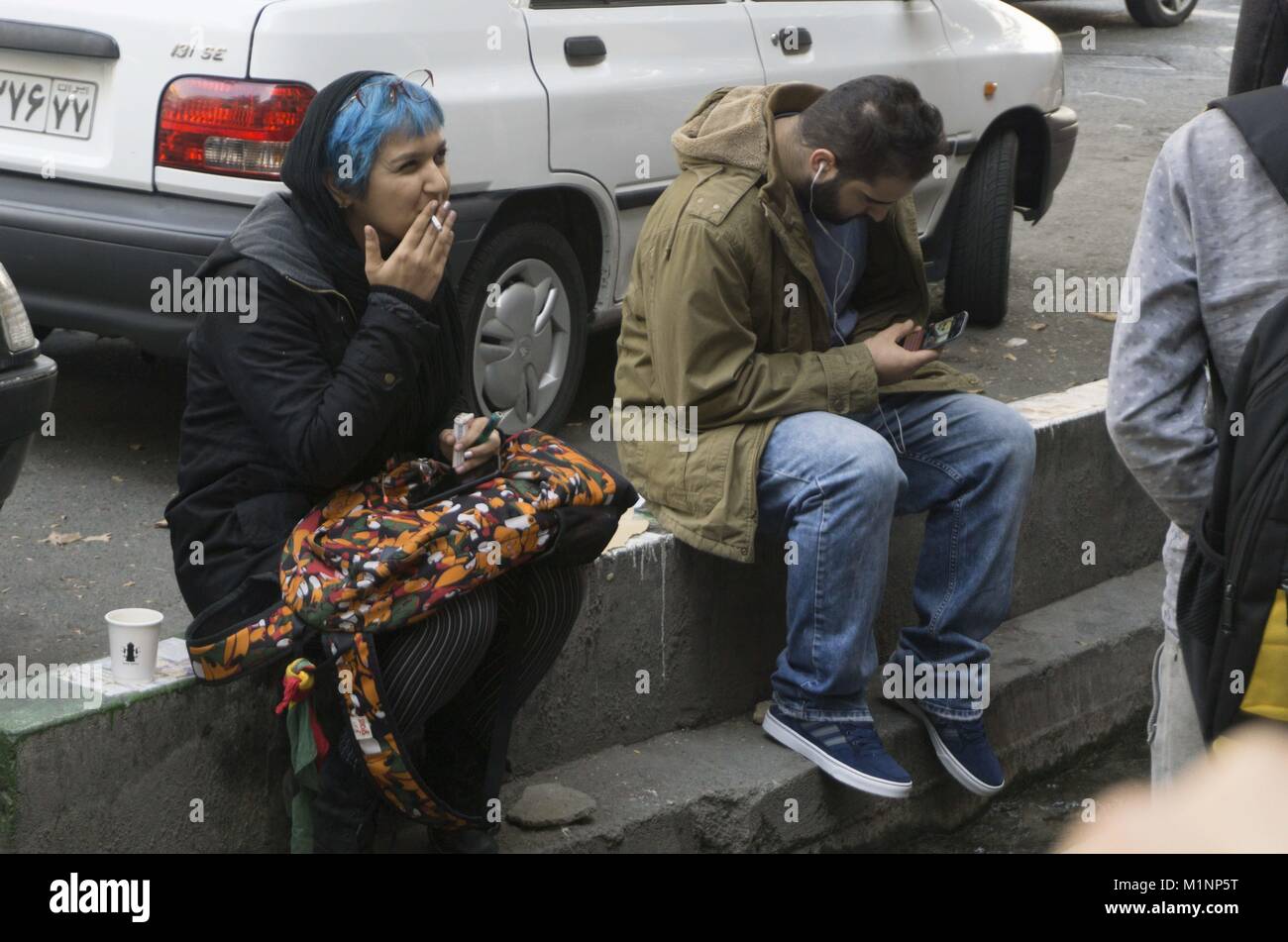 At Tehran garage, Iranian woman polishes cars and her dreams - The