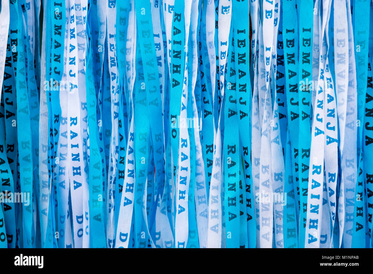 Blue Brazilian wish ribbons celebrating the Festival of Yemanja, Rainha do Mar (Queen of the Sea, in the Yoruba religion) in Salvador, Bahia, Brazil Stock Photo