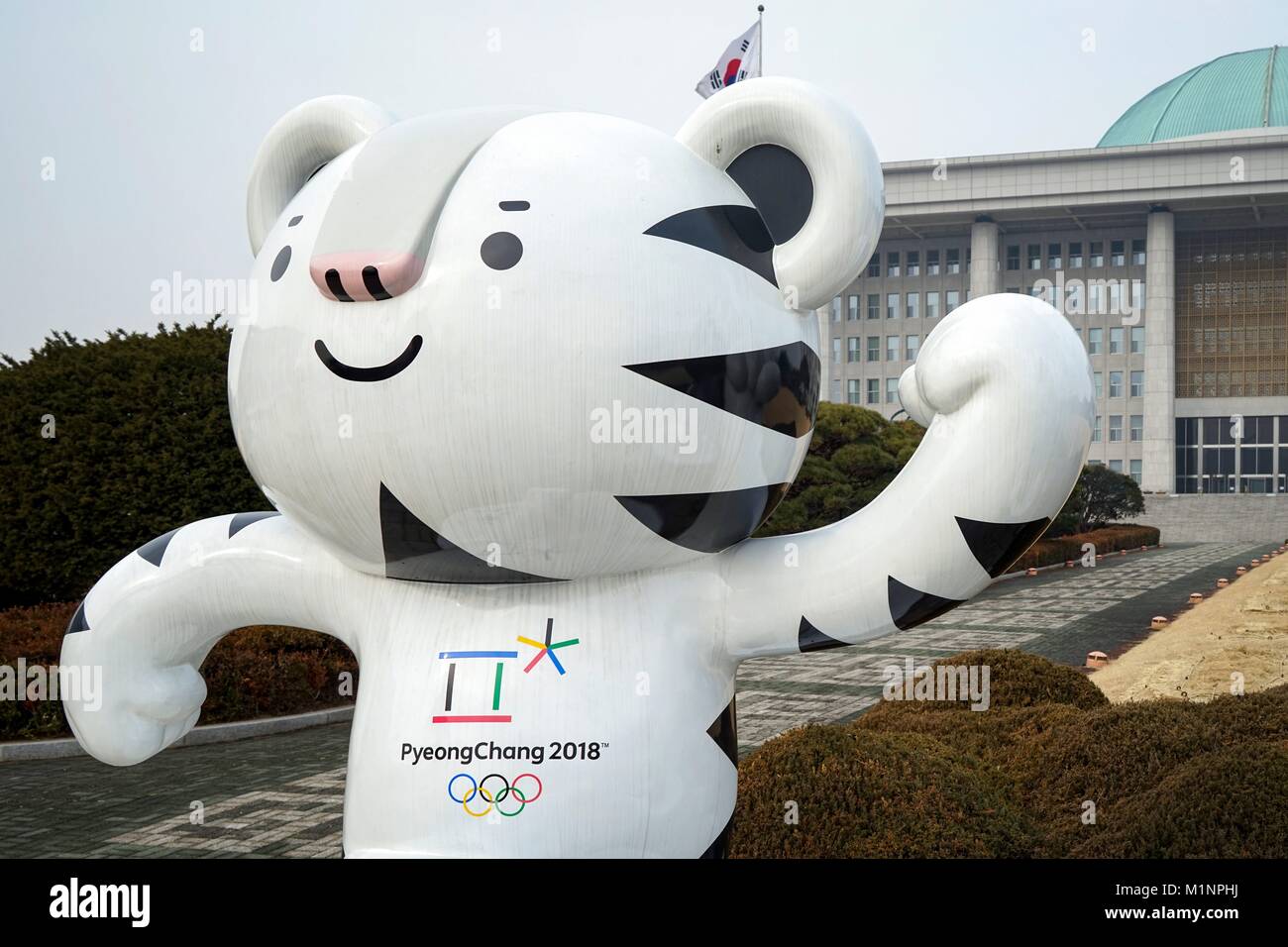 South Korea: The mascot of the PyeongChang 2018 Olympic (Soohorang) in front of the National Assembly Building of South Korea in Seoul. Photo from 30. December 2017. | usage worldwide Stock Photo