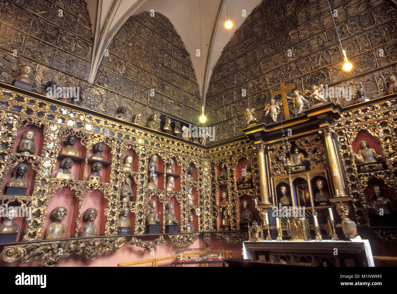 Germany, Cologne, the Golden Chamber of the church Saint Ursula, room with relics consist of human bones, decoration of the buttress arches, altar.  D Stock Photo
