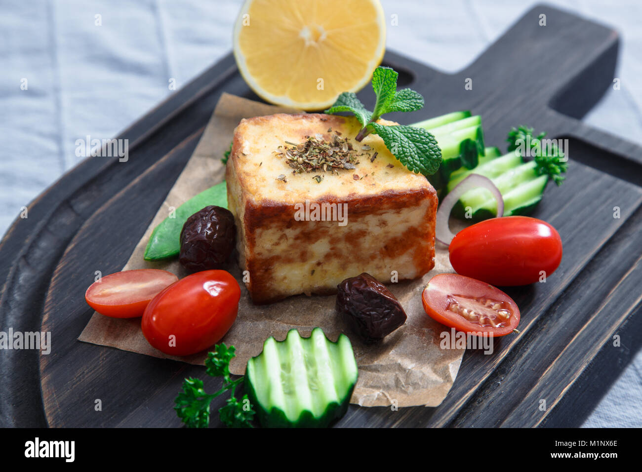 Fried halloumi cheese or cheese Saganaki Stock Photo - Alamy