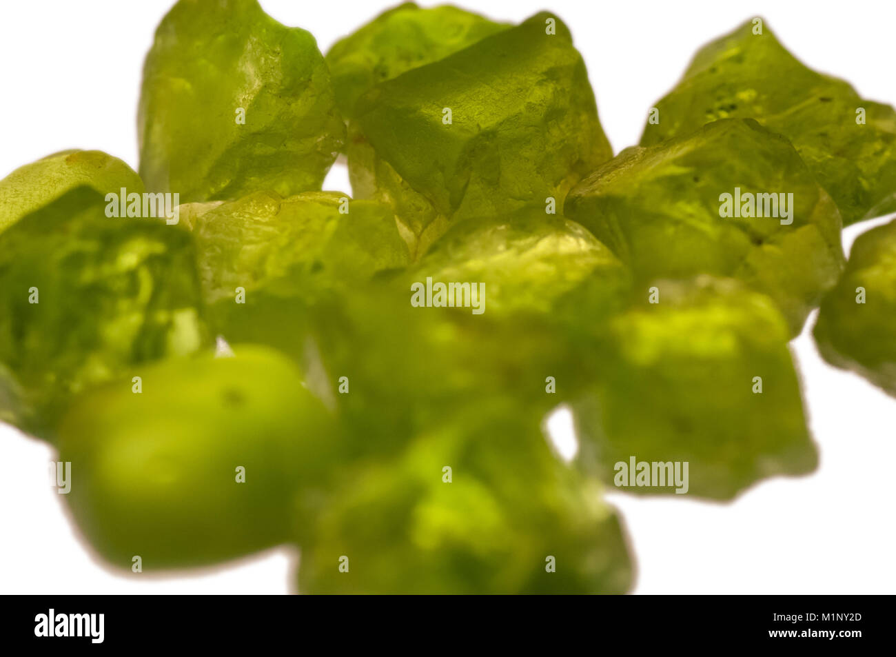 Rough green peridot stones prior to faceting Stock Photo