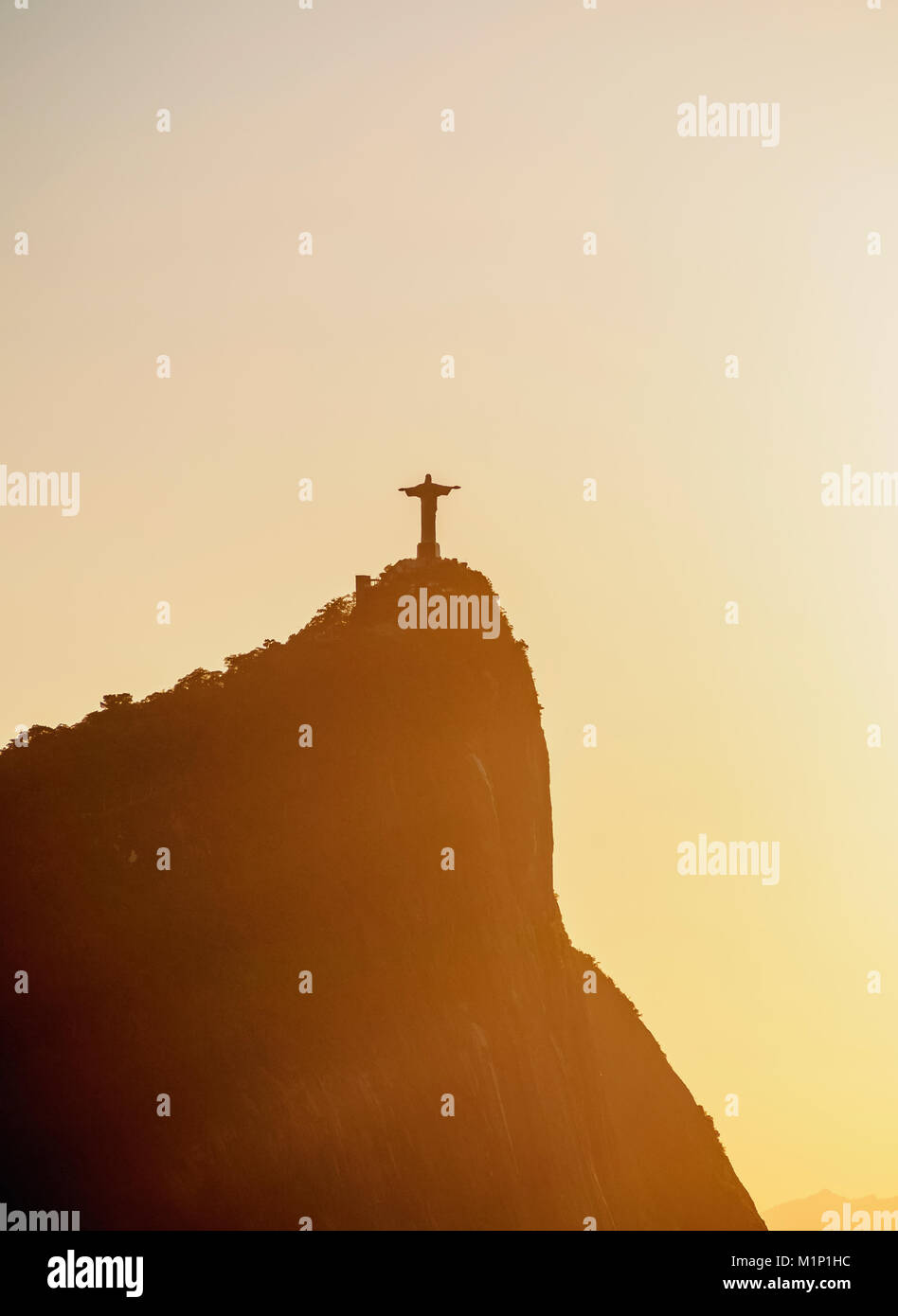 Christ the Redeemer and Corcovado Mountain at sunrise, Rio de Janeiro, Brazil, South America Stock Photo