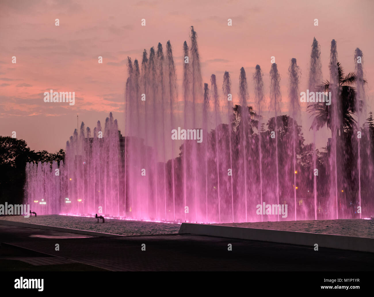Magic Water Circuit in La Reserva Park, sunset, Lima, Peru, South America Stock Photo