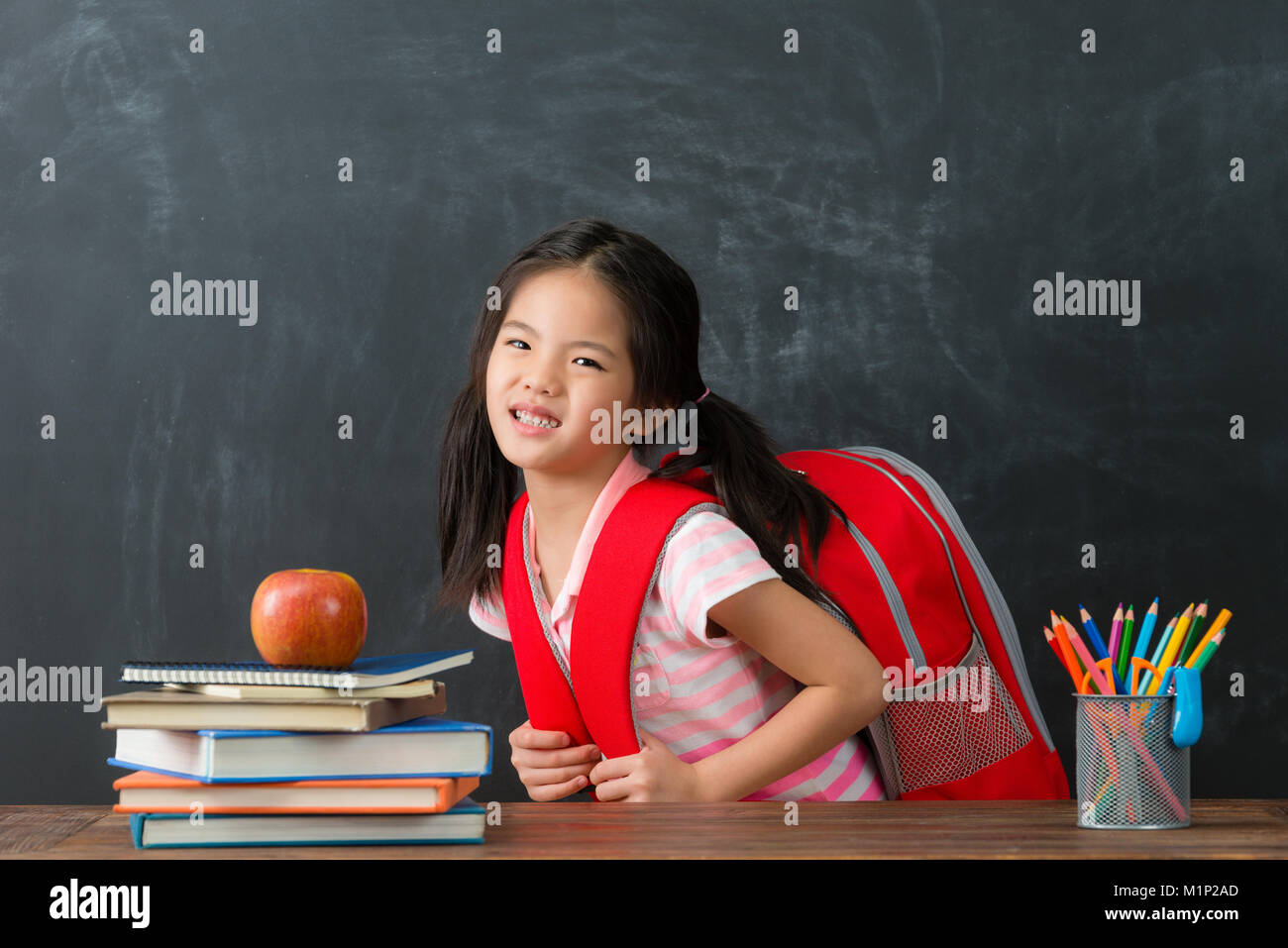 Child heavy schoolbag hires stock photography and images Alamy