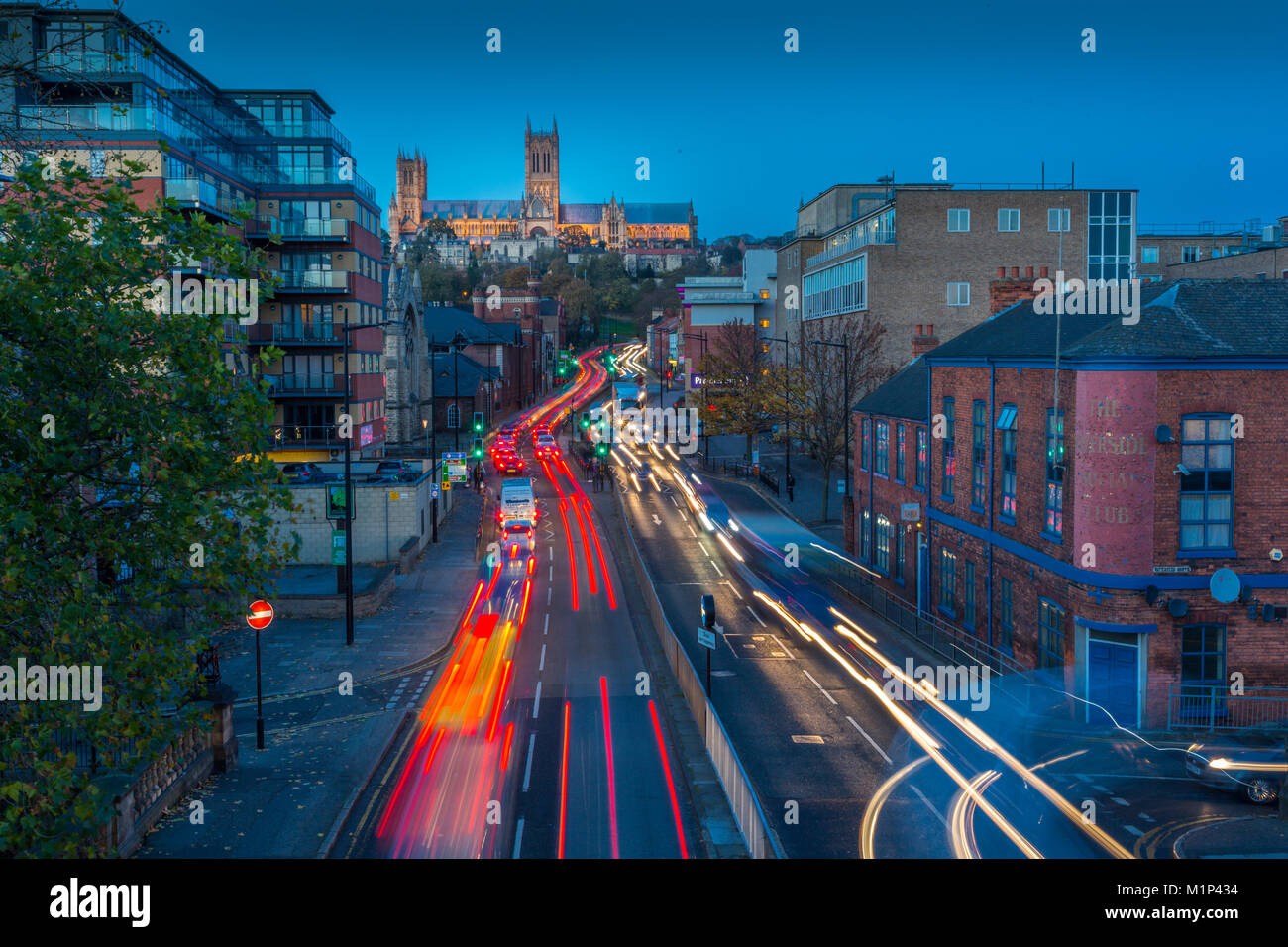 View of Lincoln Cathedral and traffic on Broadgate at dusk, Lincoln