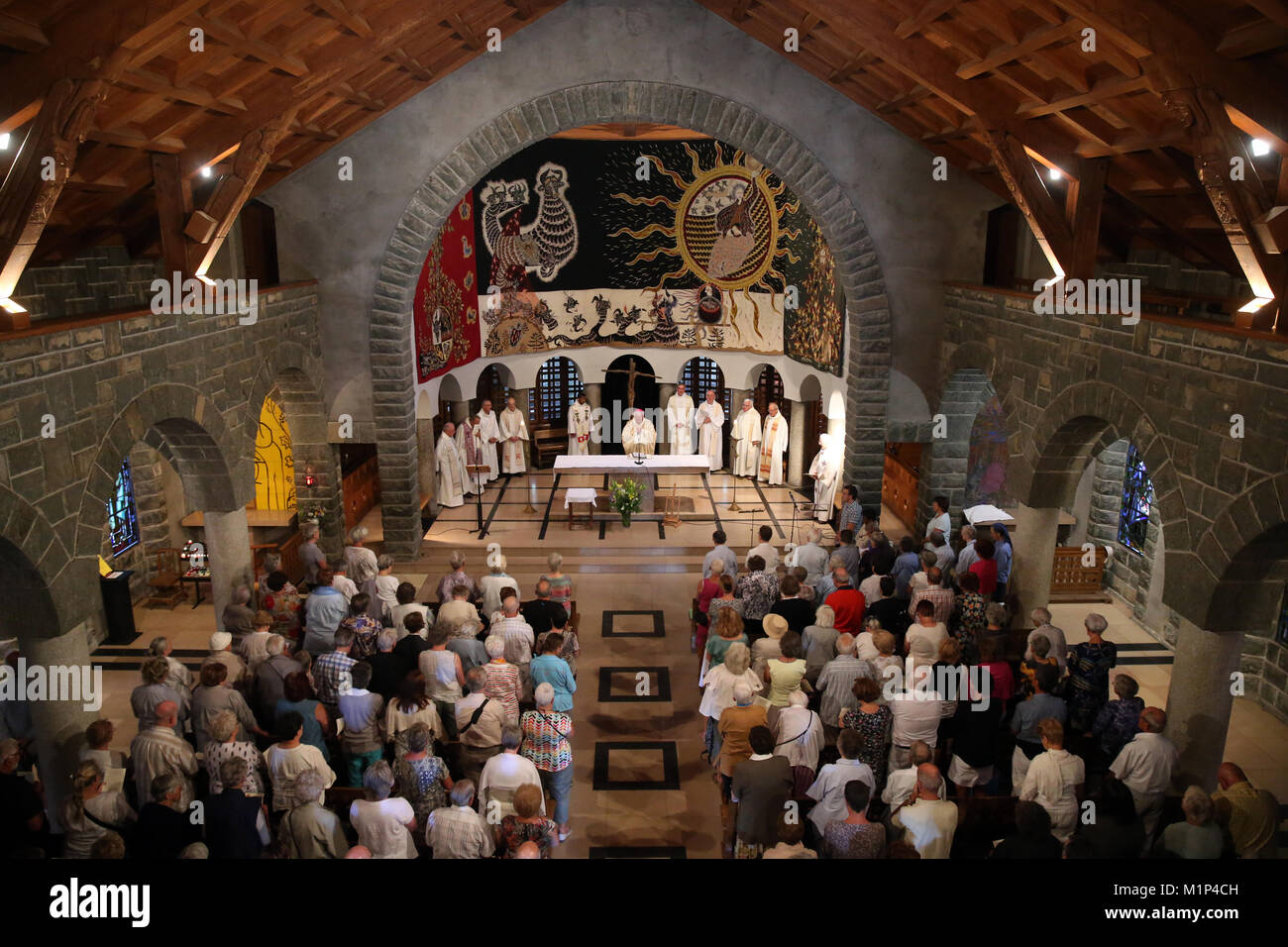 Catholic Mass, Notre-Dame de Toute Grace du Plateau d'Assy (Our Lady Full of Grace of the Plateau d'Assy), Haute-Savoie, France, Europe Stock Photo