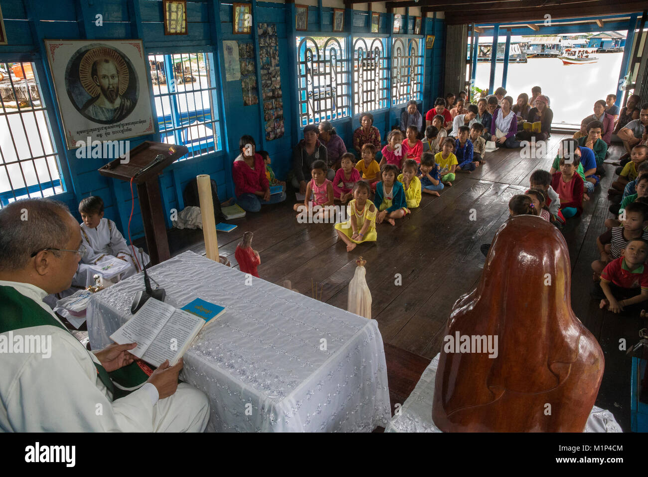 Catholic Mass in Chong Khnies floating church on the Tonle Sap Lake, Siem Reap, Cambodia, Indochina, Southeast Asia, Asia Stock Photo