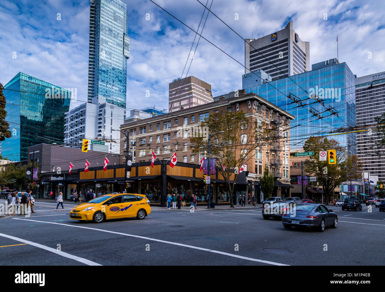 View of traffic and shoppers on Robson Street, Vancouver, British Columbia, Canada, North America Stock Photo