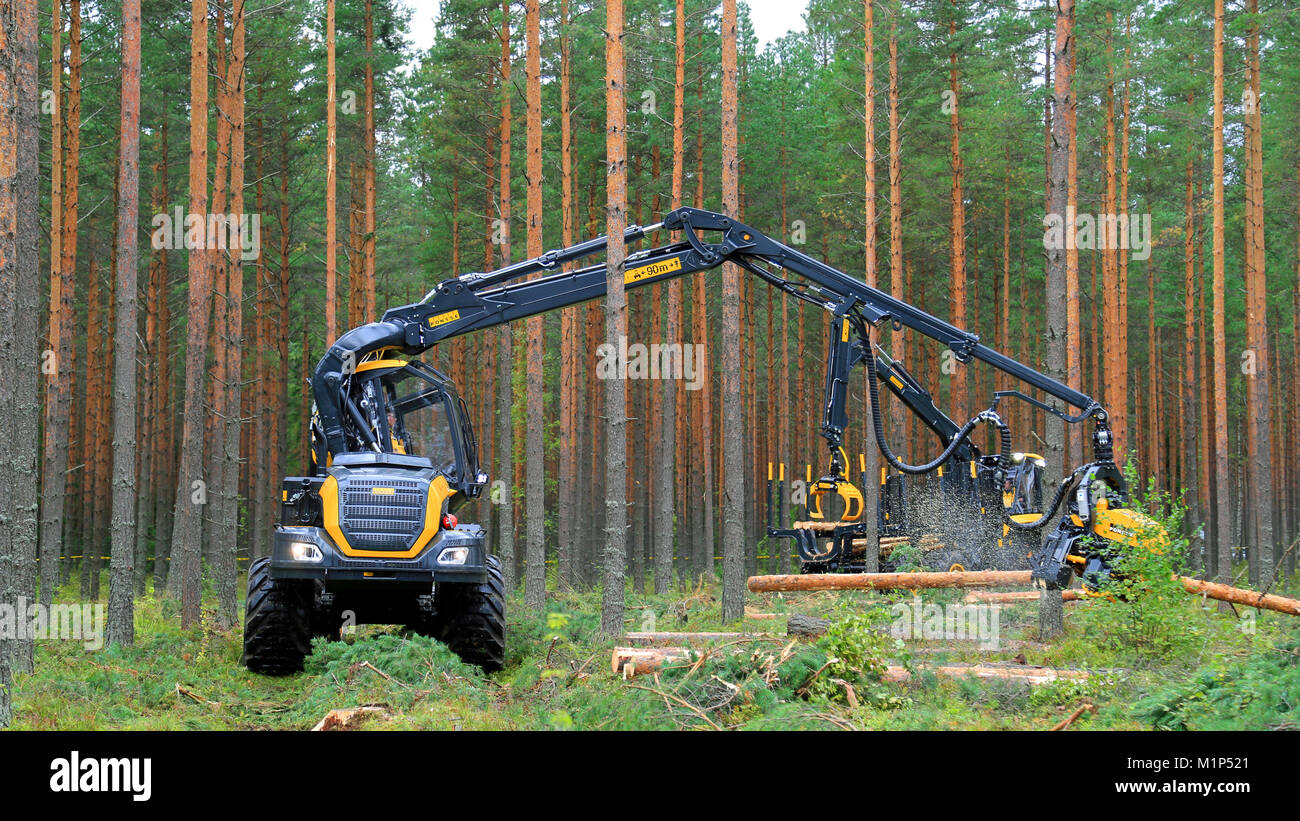 JAMSA, FINLAND - AUGUST 30, 2014: Ponsse Harvester Scorpion at work. Ponsse presents its new Model Series 2015 at FinnMETKO 2014. Stock Photo