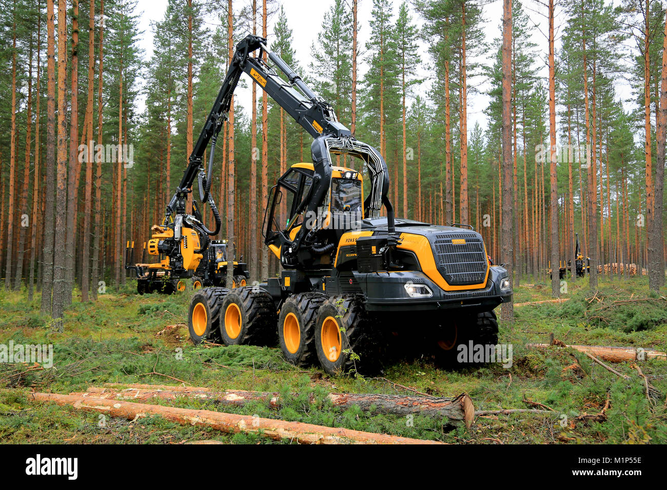 JAMSA, FINLAND - AUGUST 30, 2014: Ponsse harvester Scorpion at work. Ponsse presents its new Model Series 2015 at FinnMETKO 2014. Stock Photo